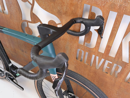 Gravel/Cyclocross von Trek, Trek Checkmate SLR 7 AXS Gravel Bike Powermeter / M/L vor USEDBIKES-OB.DE Hintergrund