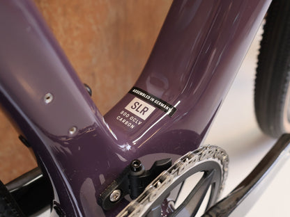 Gravel/Cyclocross von Trek, TREK CHECKMATE SLR PROJECT ONE GRAVEL AXS / S vor USEDBIKES-OB.DE Hintergrund
