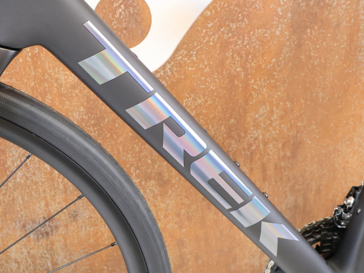 Rennrad von Trek, TREK DOMANE SL 5 GEN 5 MATTE DEEP SMOKE / M vor USEDBIKES-OB.DE Hintergrund