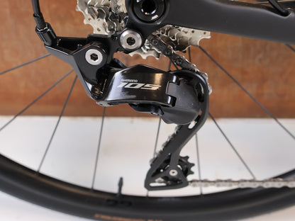 Rennrad von Trek, TREK DOMANE SL 5 GEN 5 MATTE DEEP SMOKE / S vor USEDBIKES-OB.DE Hintergrund