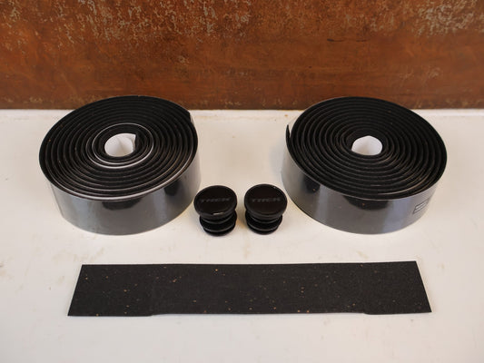 Griffe und Lenkerbänder von Trek, TREK DOUBLE GEL CORK LENKERBANDSET BLACK / 5327513 vor USEDBIKES-OB.DE Hintergrund
