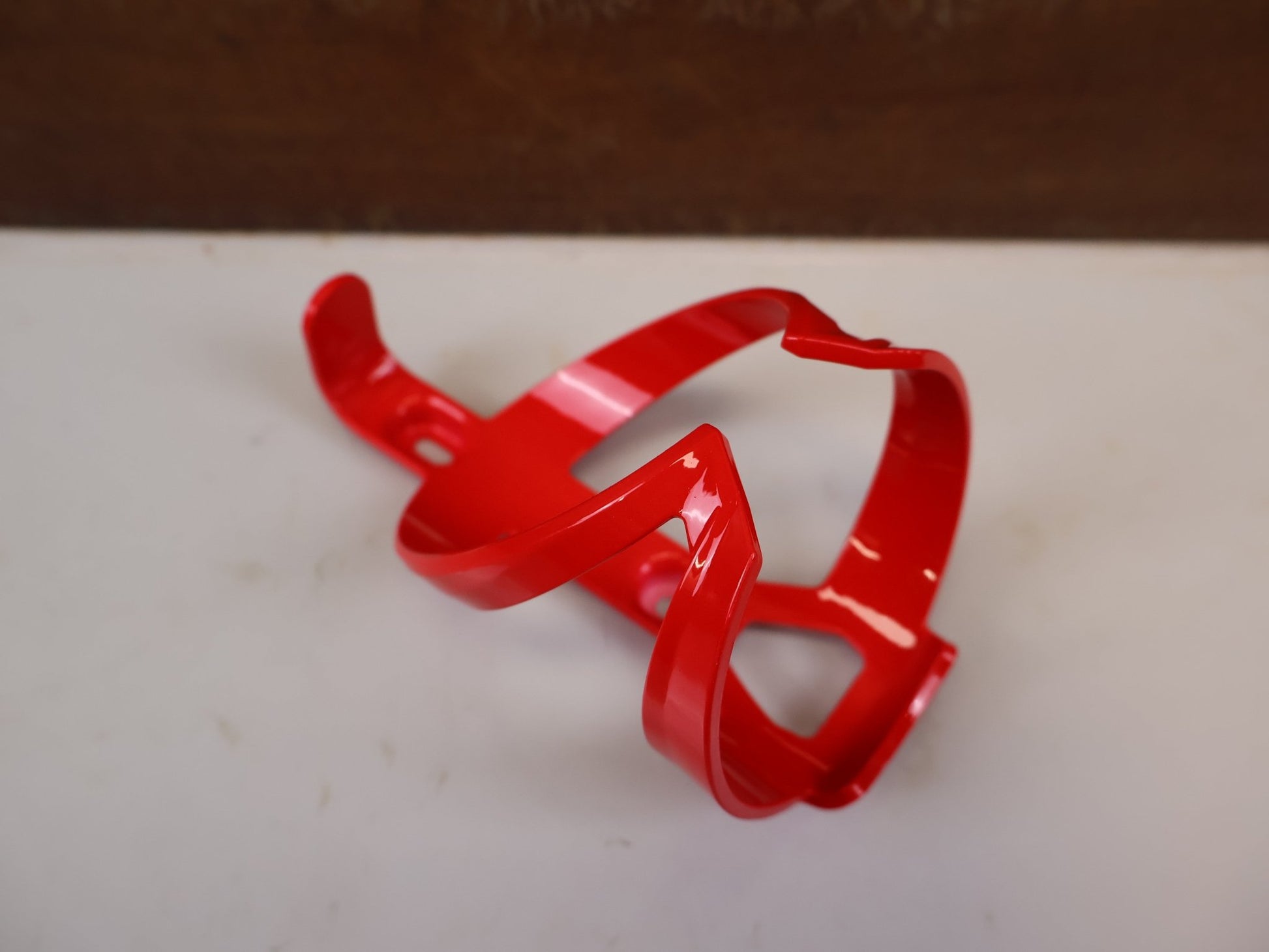 Trinkflaschen und Halter von Trek, TREK ELITE CAGE RECYCLED FLASCHENHALTER RADIOACTIVE RED vor USEDBIKES-OB.DE Hintergrund
