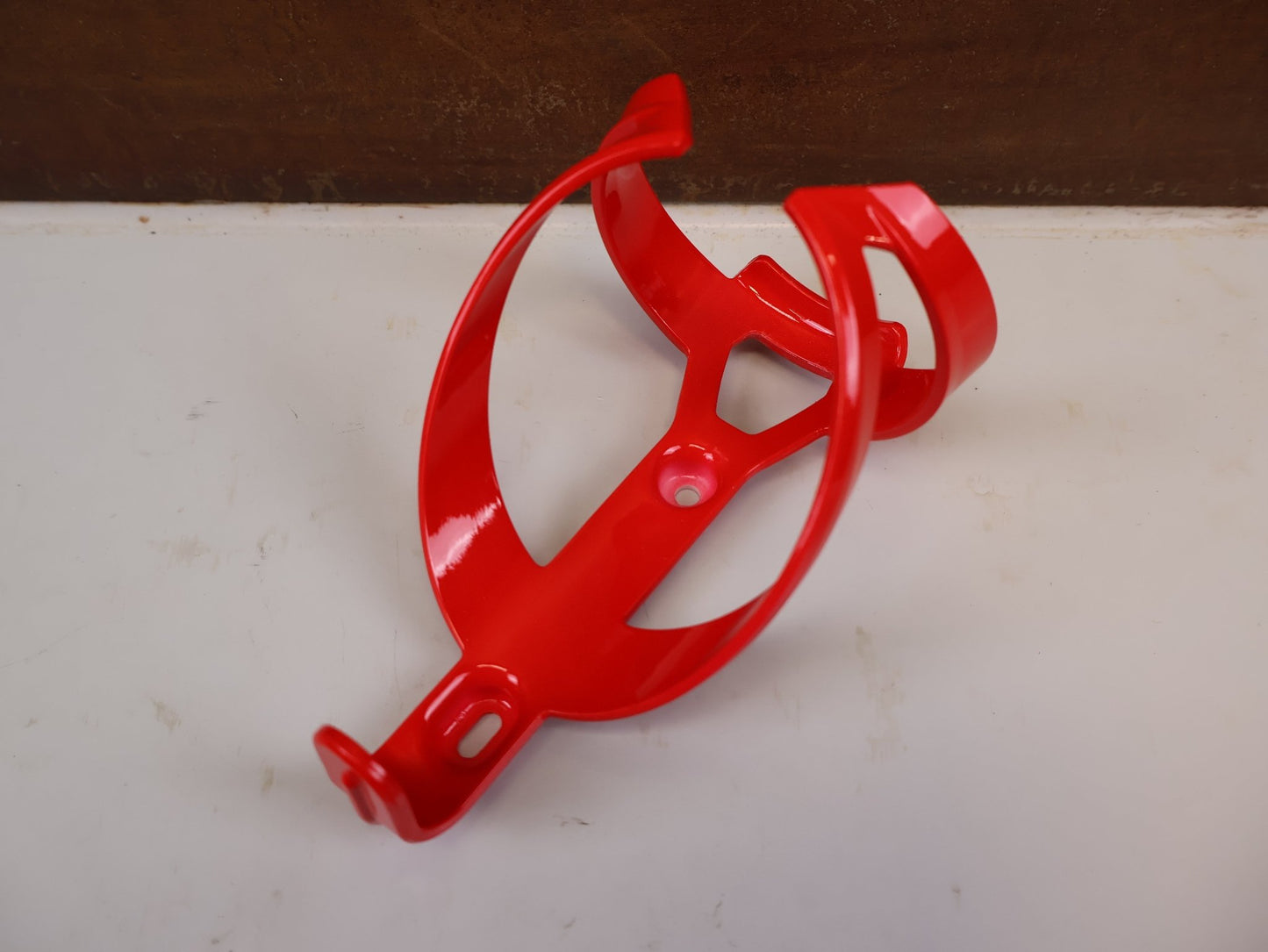 Trinkflaschen und Halter von Trek, TREK ELITE CAGE RECYCLED FLASCHENHALTER RADIOACTIVE RED vor USEDBIKES-OB.DE Hintergrund