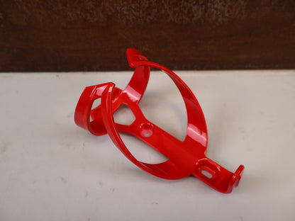 Trinkflaschen und Halter von Trek, TREK ELITE CAGE RECYCLED FLASCHENHALTER RADIOACTIVE RED vor USEDBIKES-OB.DE Hintergrund