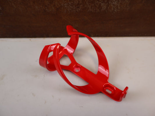 Trinkflaschen und Halter von Trek, TREK ELITE CAGE RECYCLED FLASCHENHALTER RADIOACTIVE RED vor USEDBIKES-OB.DE Hintergrund