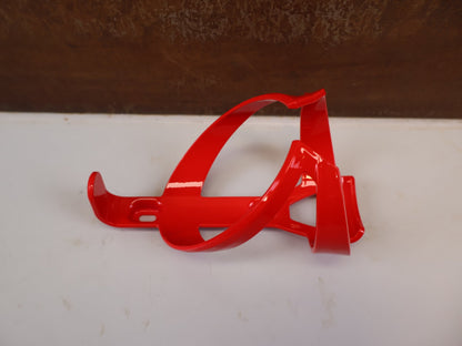 Trinkflaschen und Halter von Trek, TREK ELITE CAGE RECYCLED FLASCHENHALTER RADIOACTIVE RED vor USEDBIKES-OB.DE Hintergrund