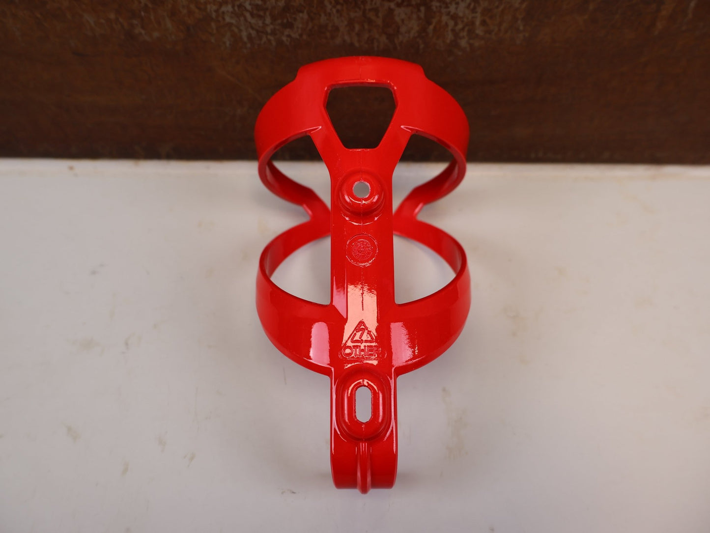 Trinkflaschen und Halter von Trek, TREK ELITE CAGE RECYCLED FLASCHENHALTER RADIOACTIVE RED vor USEDBIKES-OB.DE Hintergrund