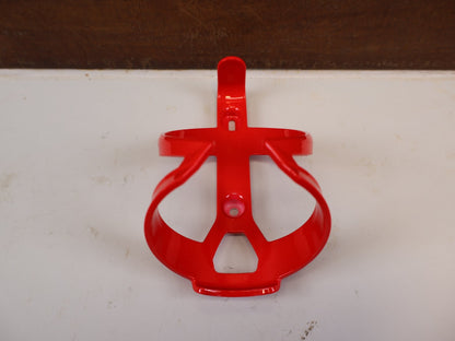 Trinkflaschen und Halter von Trek, TREK ELITE CAGE RECYCLED FLASCHENHALTER RADIOACTIVE RED vor USEDBIKES-OB.DE Hintergrund