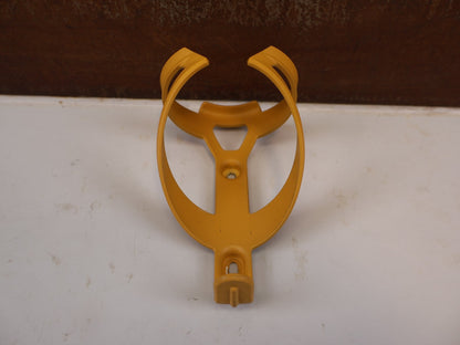 Trinkflaschen und Halter von Trek, TREK ELITE RECYCLED FLASCHENHALTER BAJA YELLOW MATT / GEBRAUCHT vor USEDBIKES-OB.DE Hintergrund