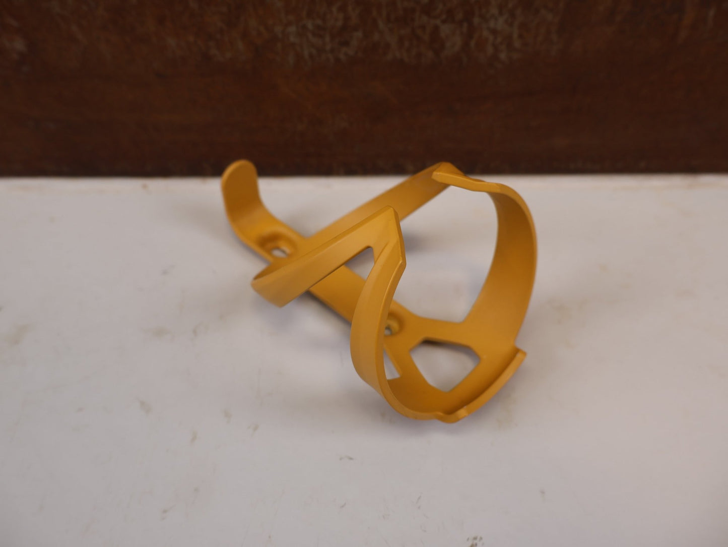 Trinkflaschen und Halter von Trek, TREK ELITE RECYCLED FLASCHENHALTER BAJA YELLOW MATT / GEBRAUCHT vor USEDBIKES-OB.DE Hintergrund