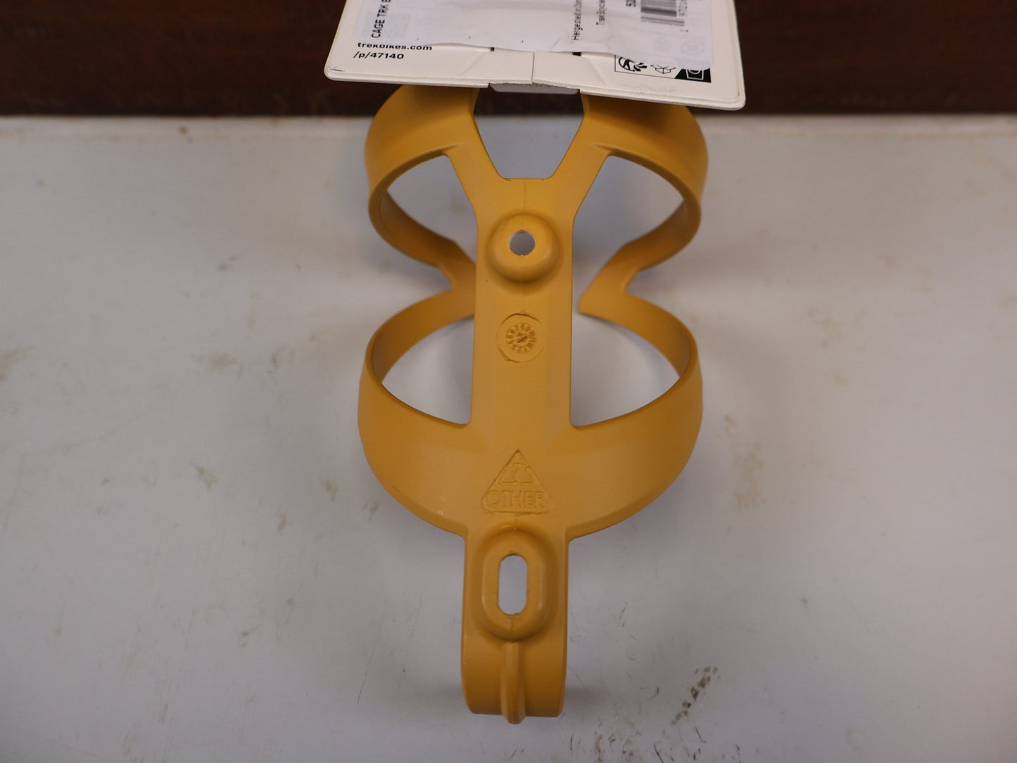 Trinkflaschen und Halter von Trek, TREK ELITE RECYCLED FLASCHENHALTER BAJA YELLOW MATT vor USEDBIKES-OB.DE Hintergrund