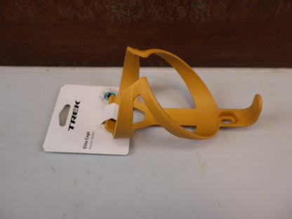 Trinkflaschen und Halter von Trek, TREK ELITE RECYCLED FLASCHENHALTER BAJA YELLOW MATT vor USEDBIKES-OB.DE Hintergrund