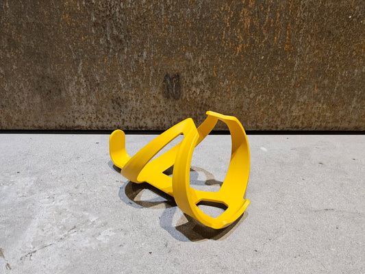 Trinkflaschen und Halter von Trek, TREK ELITE RECYCLED FLASCHENHALTER / BAJA YELLOW vor USEDBIKES - OB.DE Hintergrund