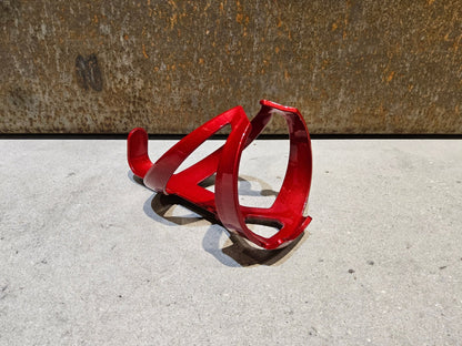 Trinkflaschen und Halter von Trek, TREK ELITE RECYCLED FLASCHENHALTER / CRIMSON DARK RED vor USEDBIKES - OB.DE Hintergrund