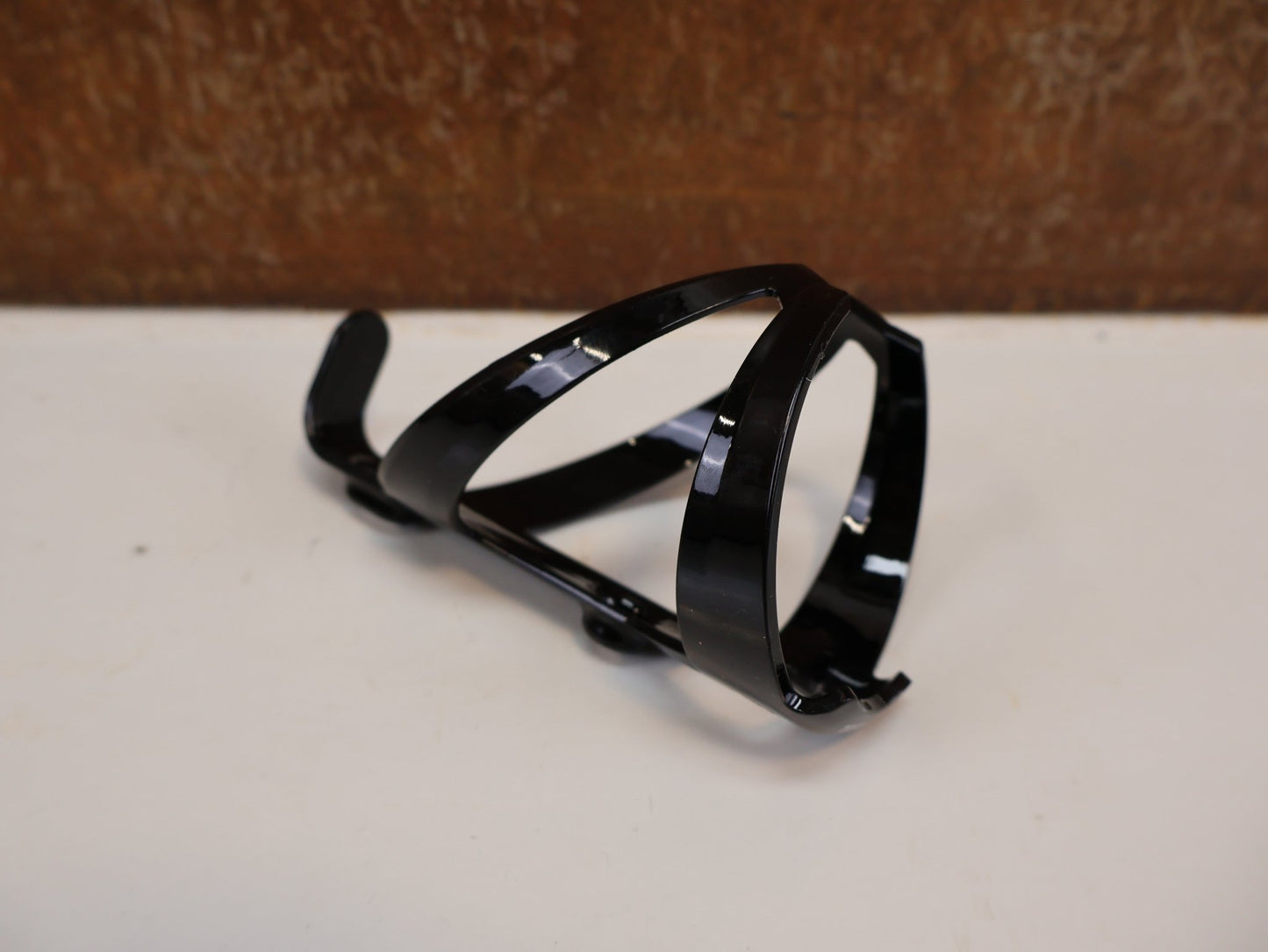 Trinkflaschen und Halter von Trek, TREK ELITE RECYCLED FLASCHENHALTER – OCEAN RECYCLED PLASTIC / 38 G / BLACK vor USEDBIKES - OB.DE Hintergrund