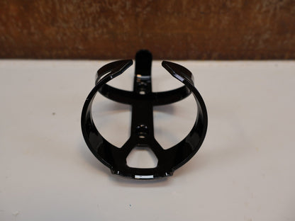 Trinkflaschen und Halter von Trek, TREK ELITE RECYCLED FLASCHENHALTER – OCEAN RECYCLED PLASTIC / 38 G / BLACK vor USEDBIKES - OB.DE Hintergrund