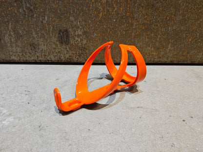 Trinkflaschen und Halter von Trek, TREK ELITE RECYCLED FLASCHENHALTER / ROARANGE vor USEDBIKES - OB.DE Hintergrund