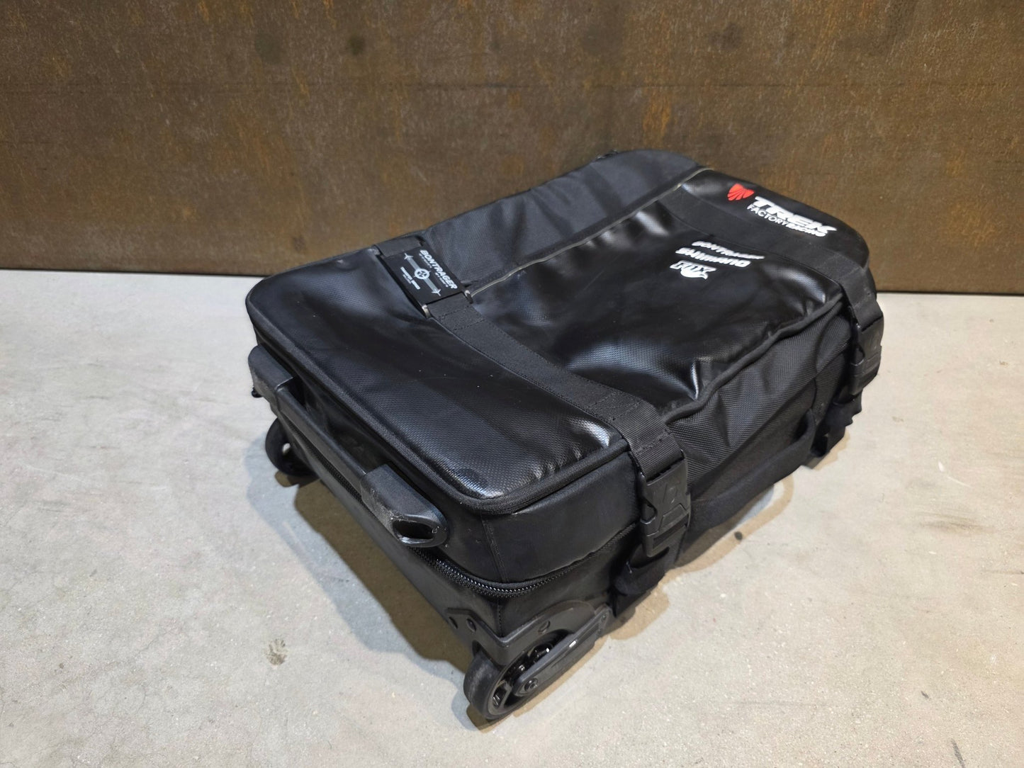 Zubehör von Bontrager, TREK FACTORY RACING TROLLEY - BONTRAGER TRANSFER SERIES MALLORCA vor USEDBIKES - OB.DE Hintergrund