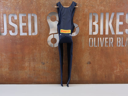 Herrenbekleidung - TFR von Santini, TREK FACTORY RACING XC THERMAL BIBTIGHT / LANGE TRÄGERHOSE / HERREN vor USEDBIKES-OB.DE Hintergrund
