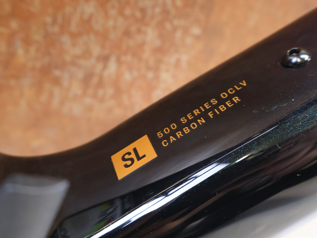 Rennradrahmen von Trek, Trek Madone SL Gen 8 Rahmenset M/L Dark Star OCLV Carbon vor USEDBIKES-OB.DE Hintergrund