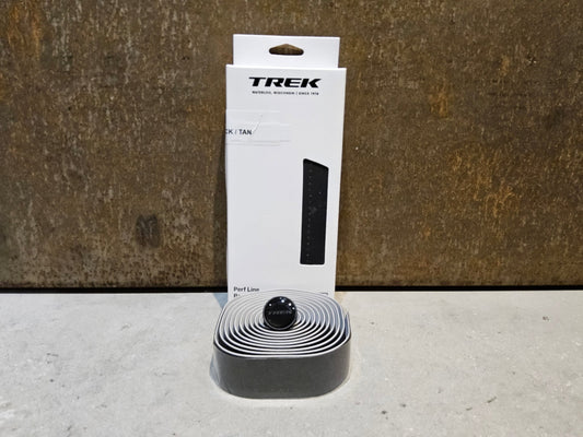 Griffe und Lenkerbänder von Trek, TREK PERF LINE LENKERBANDSET / TAN vor USEDBIKES - OB.DE Hintergrund