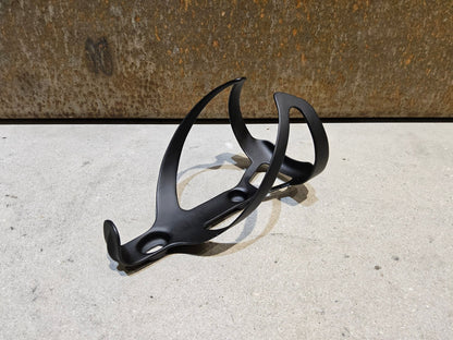 Trinkflaschen und Halter von Trek, TREK PRO CARBON FLASCHENHALTER / BLACK MATT vor USEDBIKES - OB.DE Hintergrund