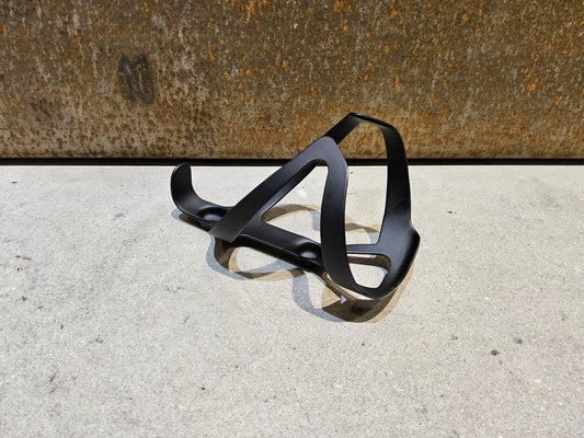 Trinkflaschen und Halter von Trek, TREK PRO CARBON FLASCHENHALTER / BLACK MATT vor USEDBIKES - OB.DE Hintergrund