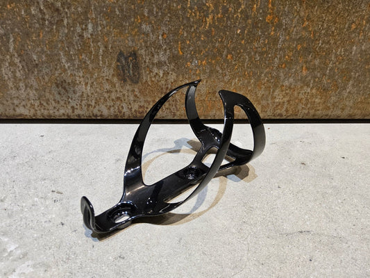 Trinkflaschen und Halter von Trek, TREK PRO CARBON FLASCHENHALTER / BLACK vor USEDBIKES - OB.DE Hintergrund