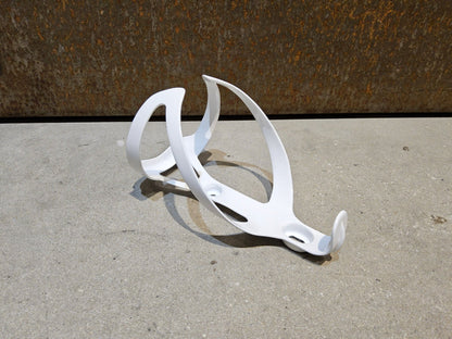 Trinkflaschen und Halter von Trek, TREK PRO CARBON FLASCHENHALTER / WHITE vor USEDBIKES - OB.DE Hintergrund