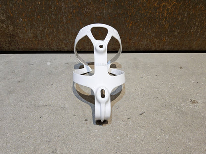 Trinkflaschen und Halter von Trek, TREK PRO CARBON FLASCHENHALTER / WHITE vor USEDBIKES - OB.DE Hintergrund