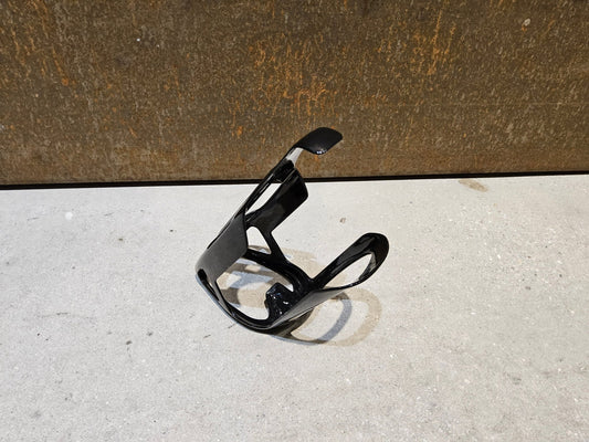 Trinkflaschen und Halter von Trek, TREK RSL AERO CARBON FLASCHENHALTER / BLACK/GREY vor USEDBIKES - OB.DE Hintergrund