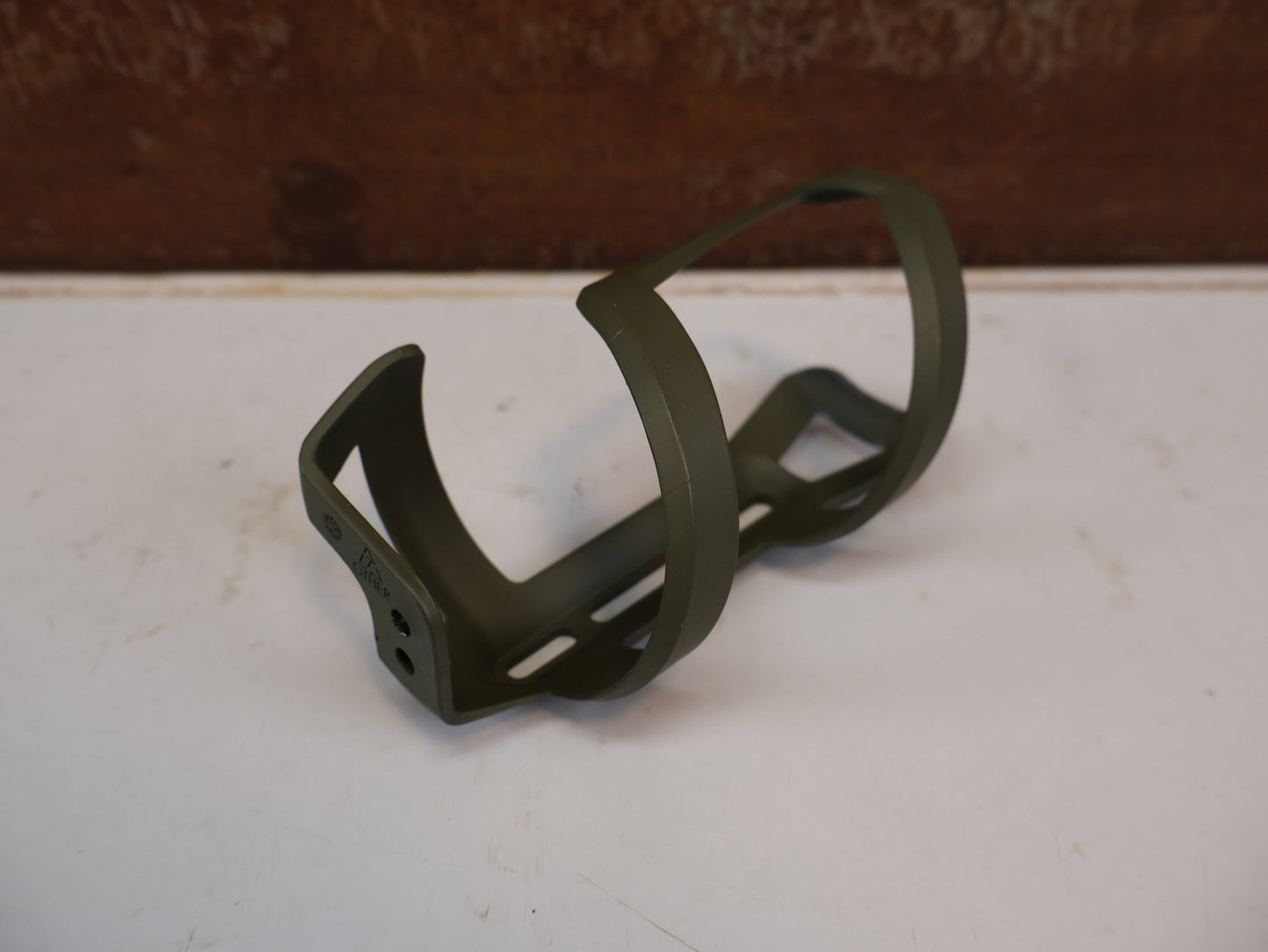 Trinkflaschen und Halter von Trek, TREK SIDE LOAD RECYCLED FLASCHENHALTER OLIVE GREY MATT / LINKS U. RECHTS vor USEDBIKES-OB.DE Hintergrund