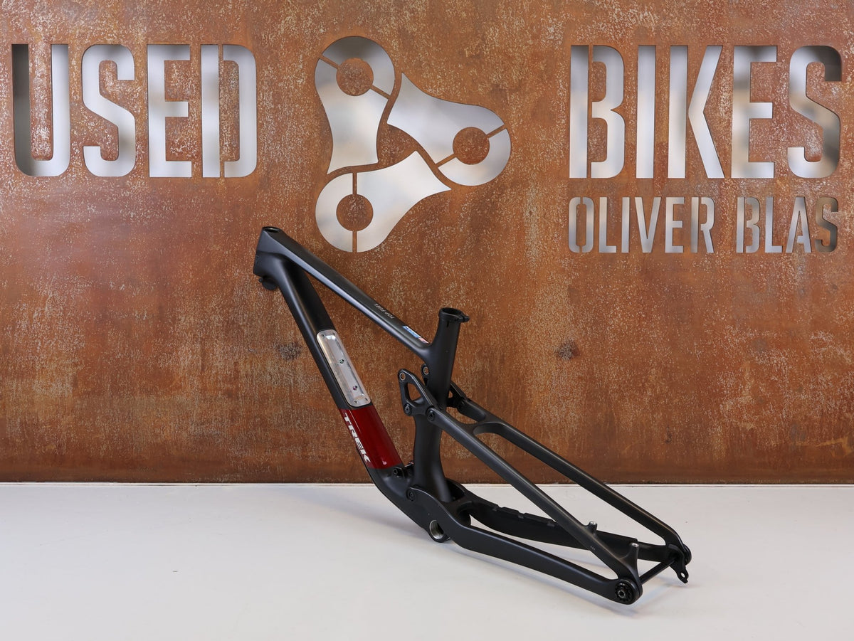 Mountainbikerahmen von Trek, TREK TOP FUEL CARBON RAHMEN / GRÖßE M / FACTORY RACING TEAM / BASTLERWARE vor USEDBIKES-OB.DE Hintergrund