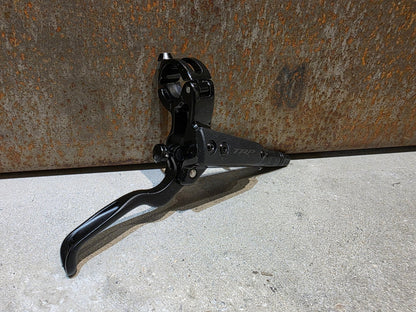 Bremse von TRP, TRP TRAIL EVO HD - M843 SCHEIBENBREMSE 203MM VORNE UND HINTEN vor USEDBIKES - OB.DE Hintergrund