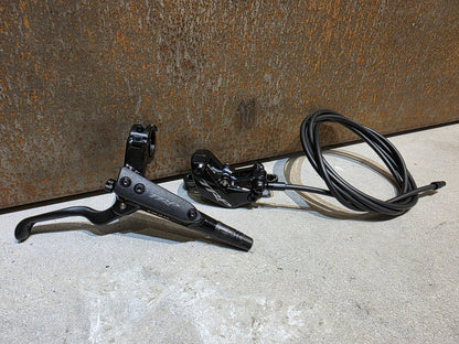 Bremse von TRP, TRP TRAIL EVO HD - M843 SCHEIBENBREMSE 203MM VORNE UND HINTEN vor USEDBIKES - OB.DE Hintergrund