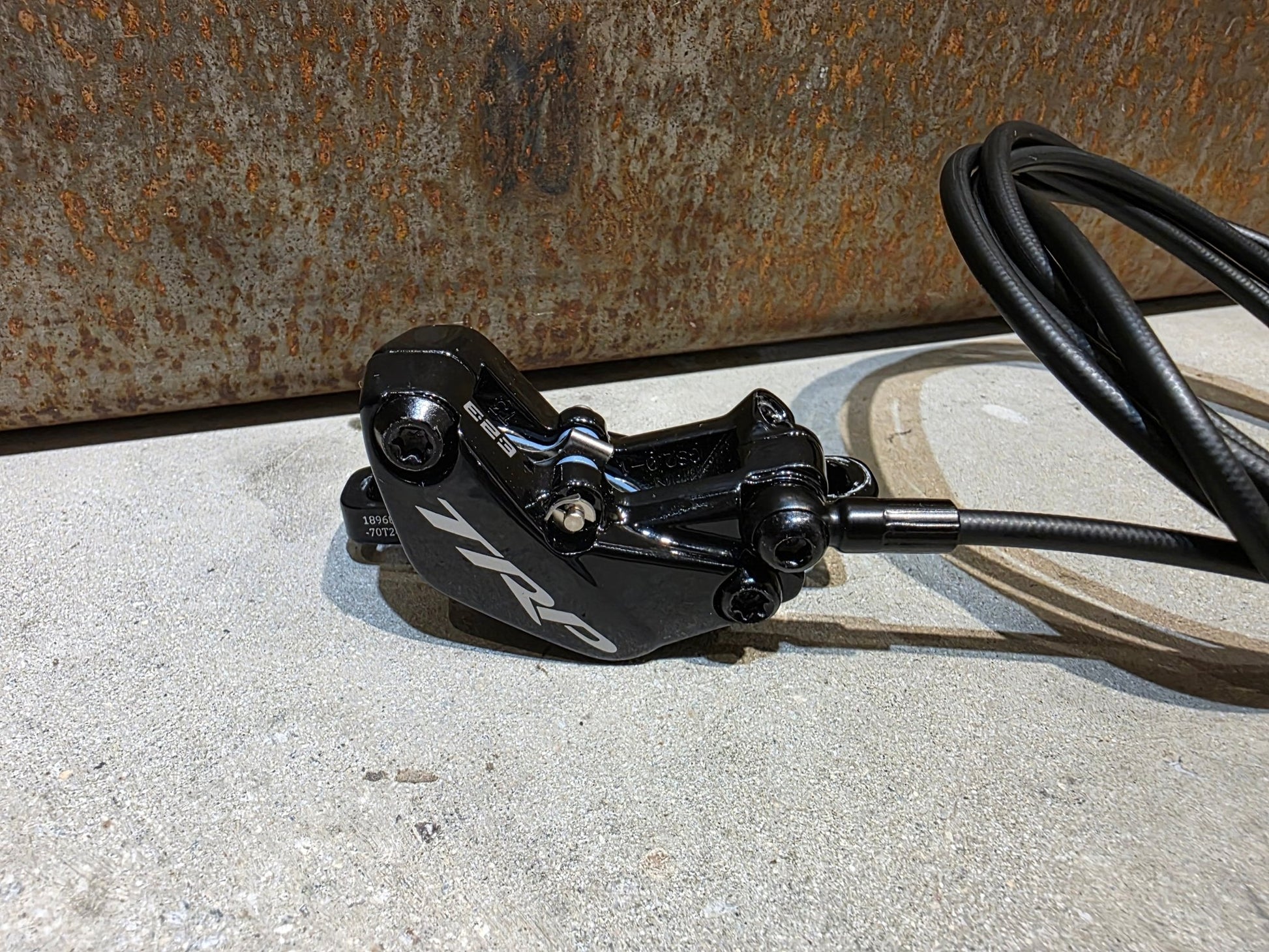 Bremse von TRP, TRP TRAIL EVO HD - M843 SCHEIBENBREMSE 203MM VORNE UND HINTEN vor USEDBIKES - OB.DE Hintergrund