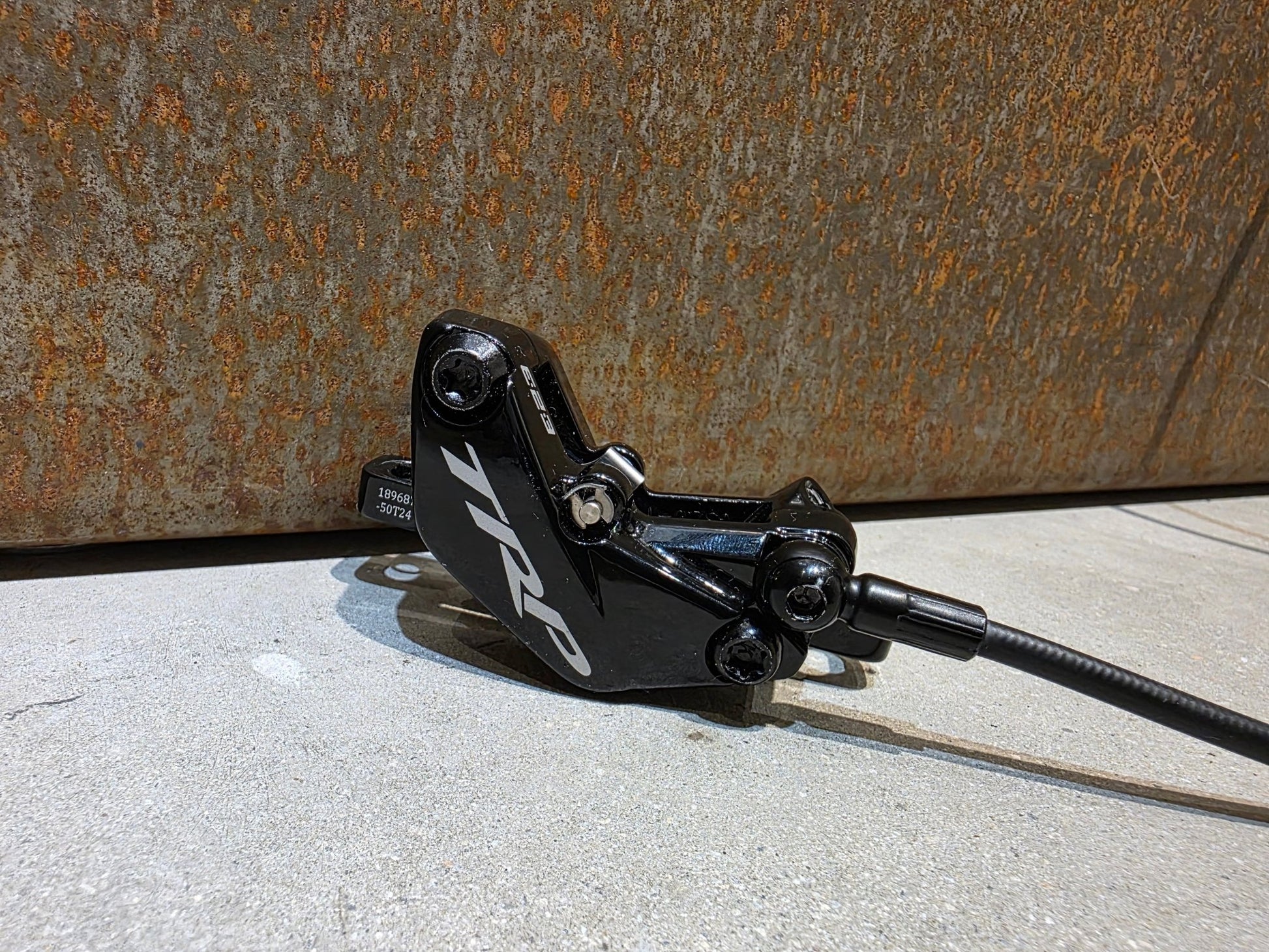 Bremse von TRP, TRP TRAIL EVO HD - M843 SCHEIBENBREMSE 203MM VORNE UND HINTEN vor USEDBIKES - OB.DE Hintergrund
