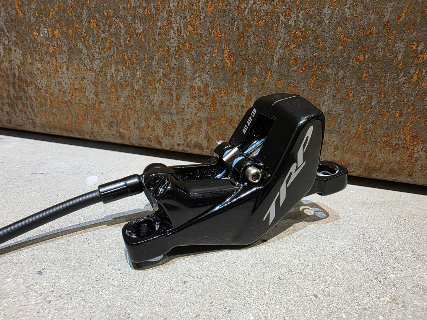 Bremse von TRP, TRP TRAIL EVO HD - M843 SCHEIBENBREMSE 203MM VORNE UND HINTEN vor USEDBIKES - OB.DE Hintergrund