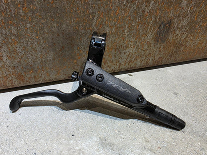 Bremse von TRP, TRP TRAIL EVO HD - M843 SCHEIBENBREMSE 203MM VORNE UND HINTEN vor USEDBIKES - OB.DE Hintergrund