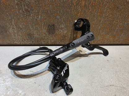 Bremse von TRP, TRP TRAIL EVO HD - M843 SCHEIBENBREMSE 203MM VORNE UND HINTEN vor USEDBIKES - OB.DE Hintergrund