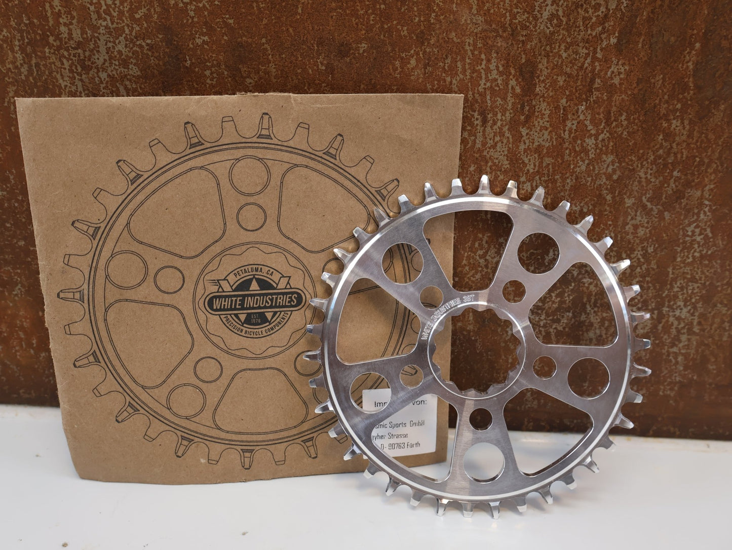 Kettenblatt von White Industries, WHITE INDUSTRIES MR30 TSR KETTENBLATT / POLISHED SILVER / 38 ZÄHNE / DIRECT MOUNT vor USEDBIKES - OB.DE Hintergrund