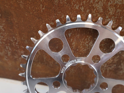 Kettenblatt von White Industries, WHITE INDUSTRIES MR30 TSR KETTENBLATT / POLISHED SILVER / 38 ZÄHNE / DIRECT MOUNT vor USEDBIKES - OB.DE Hintergrund