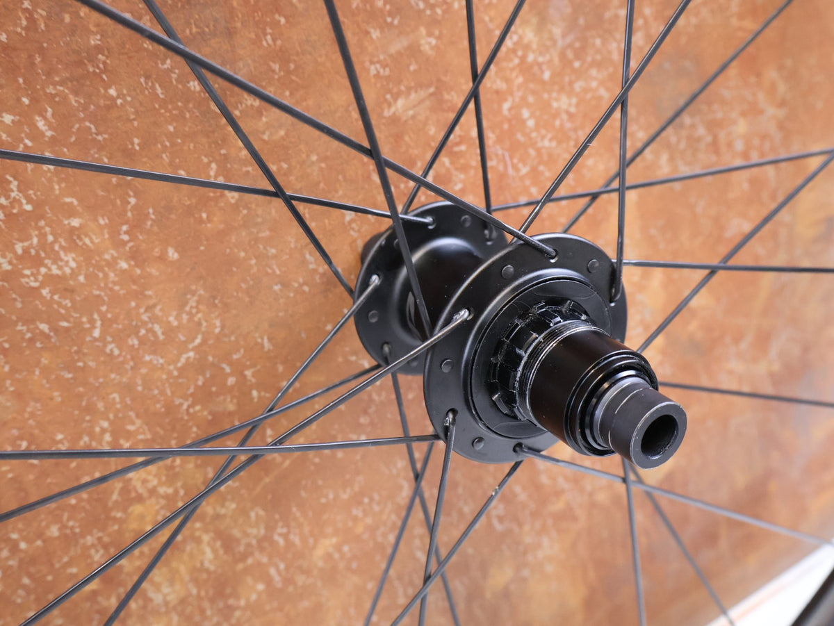 Laufrad/Laufradsatz von Zipp, ZIPP 303 Firecrest Disc Carbon Laufradsatz SRAM XDR 1428g vor USEDBIKES-OB.DE Hintergrund