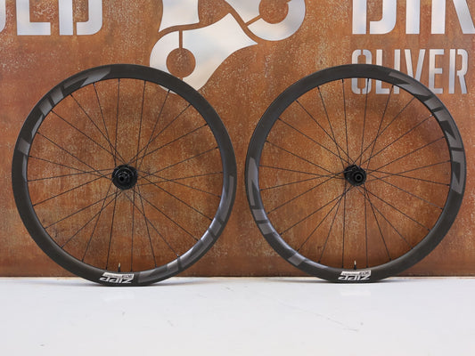 Laufrad/Laufradsatz von Zipp, ZIPP 303 Firecrest Disc Carbon Laufradsatz SRAM XDR 1428g vor USEDBIKES-OB.DE Hintergrund